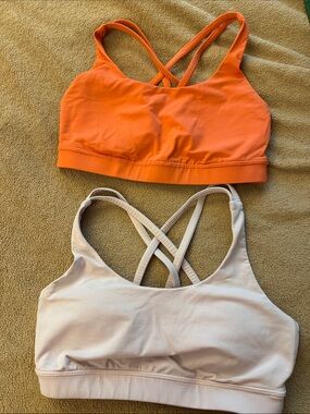 Price for both : Set of 2 lululemon sports bras coral and light pink